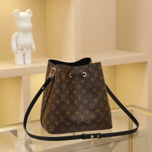 Alternative view of Monogram coated canvas Smooth calf leather trim Microfiber lining Central zippered patch pocket Removable, adjustable shoulder strap! Dimensions: 26x26x17.5cm